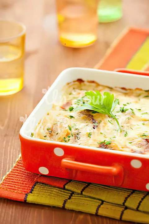Photo de Gratin pommes de terre raclette